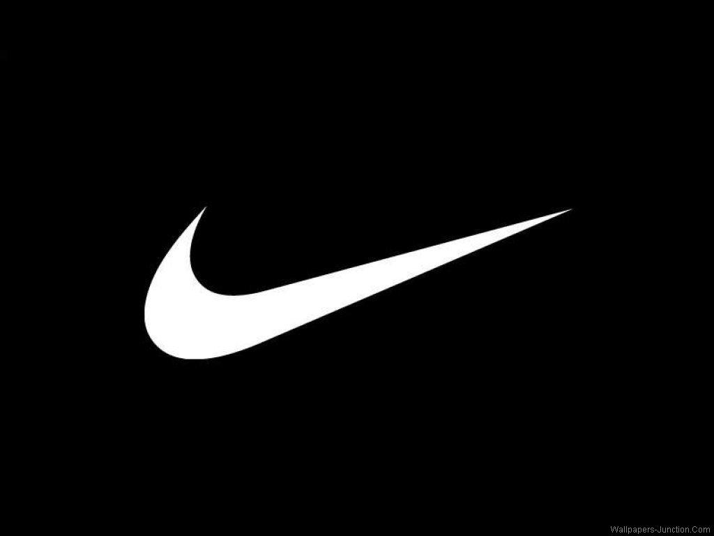 White Nike Emblem On Black Background